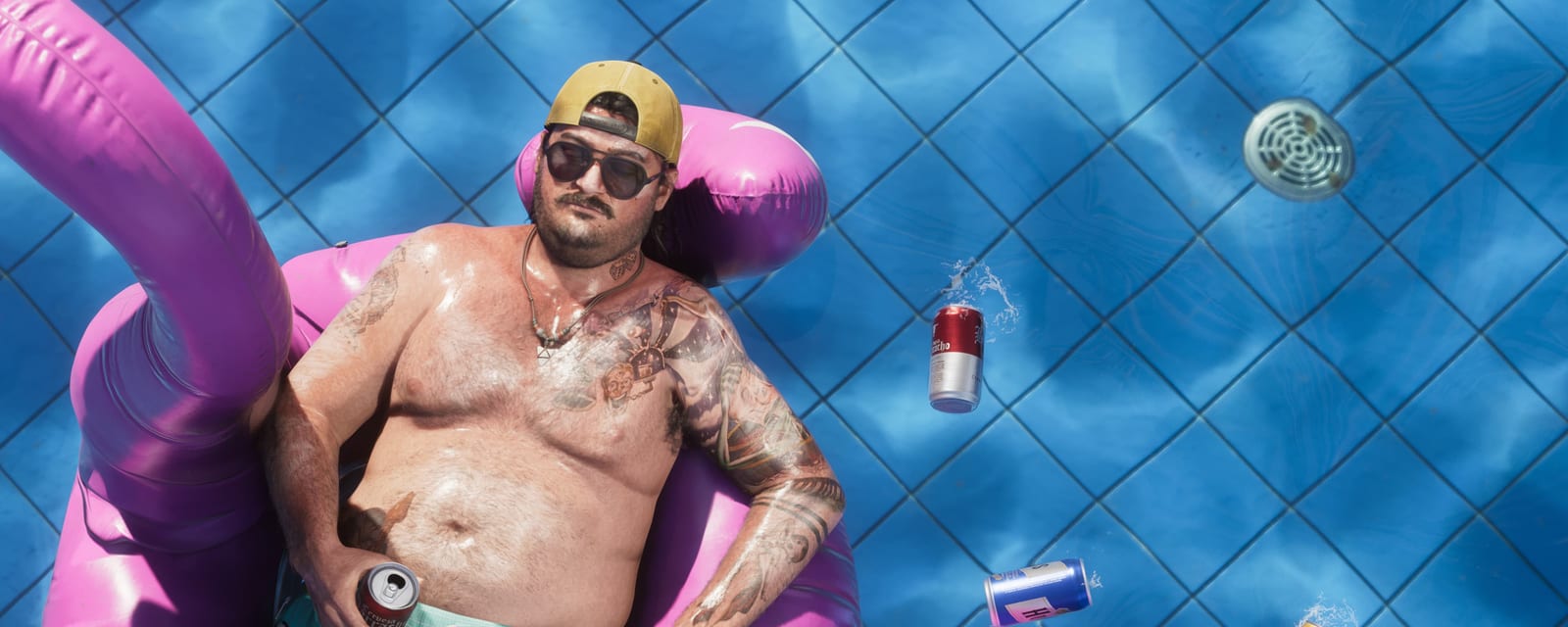 A pink flamingo float and cans falling into a pool, on an official Rockstar "Only in Leonida" campaign visual: exactly the offbeat register that tends to explode as a clip.